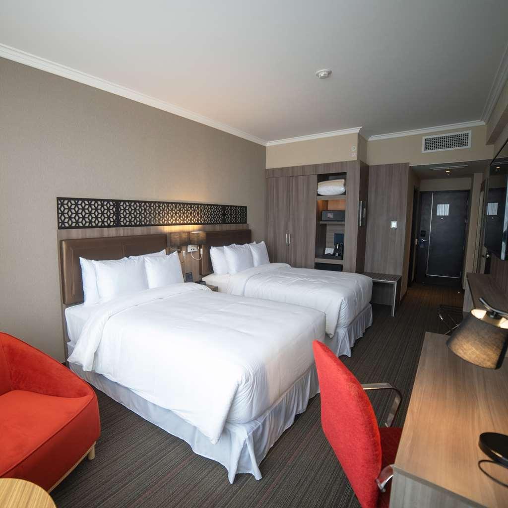 Doubletree By Hilton Trujillo Hotell Encalada Rum bild